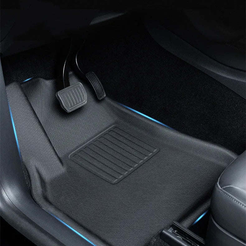 Tesla Model Y TPR floor mats showing foot mats, tailbox mats, and storage box mats