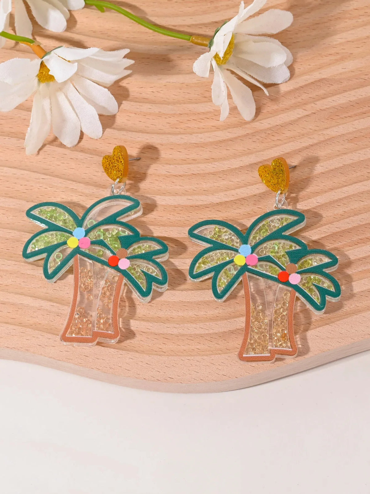 Set of acrylic earrings shaped like cherry, strawberry, watermelon, pineapple, coconut, cake, and ice cream.