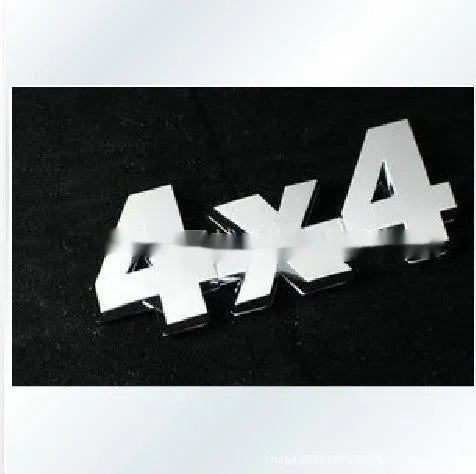 Metal 4x4 rear car badge in silver plated or black, 9cm x 3.5cm, for off-road vehicle use.