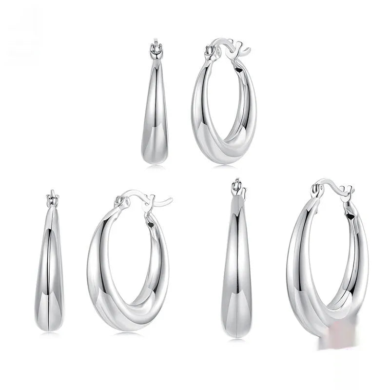 Geometric ring clip-on earrings with copper base and silver electroplated finish