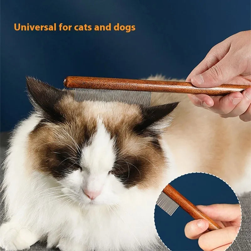 Stainless steel flea comb with dense teeth for removing fleas from a dog's coat