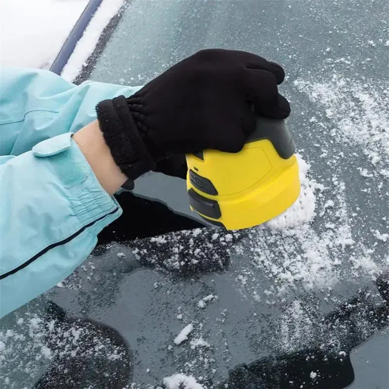 Yellow cordless electric snow scraper with ergonomic handle and removal window for car windscreen de-icing