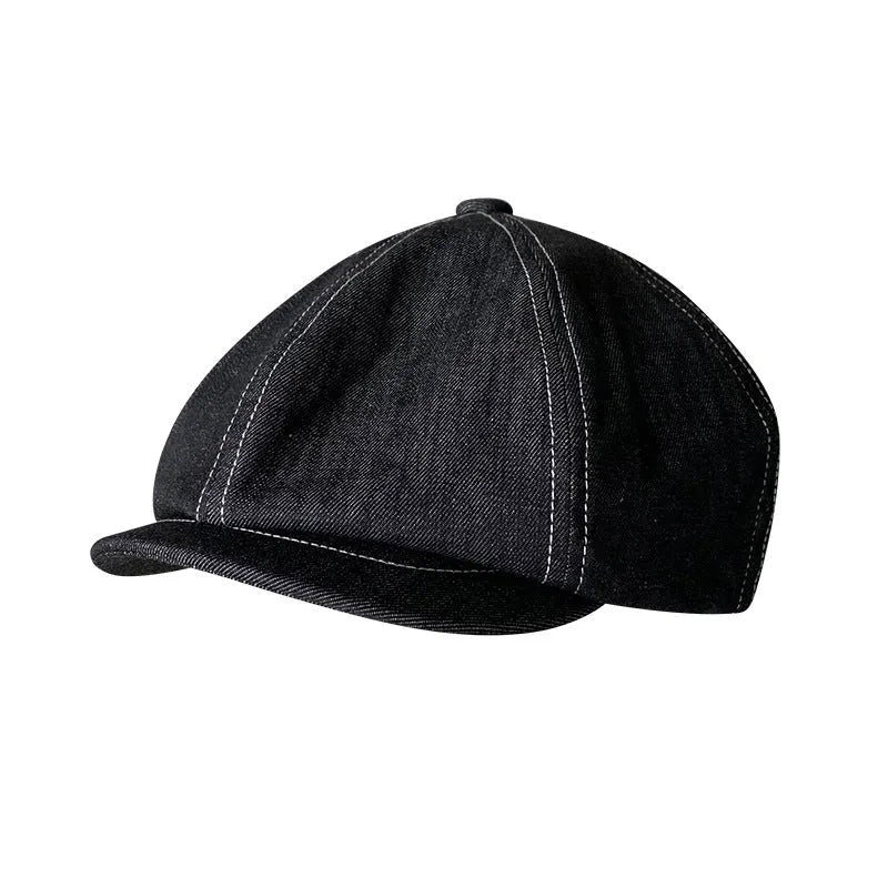 Black Japanese denim beret shown in unisex retro style with adult sizing options