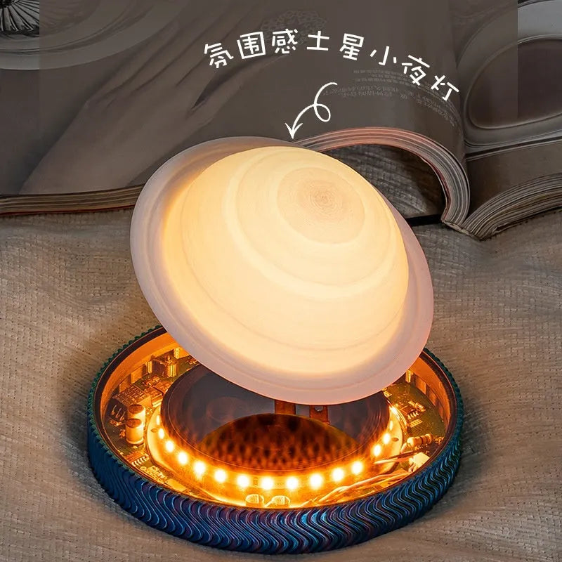 Magnetic suspension 3D printed moon night lamp on a desk with USB cable.