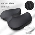 Curved bevel memory foam seat cushion for tailbone support in beige colour on a car seat.