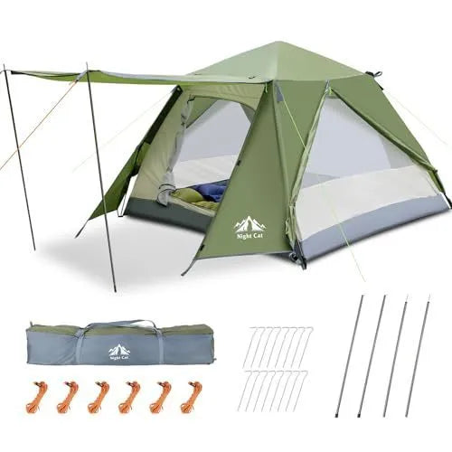 Dark green automatic pop up camping tent fully pitched in an outdoor setting