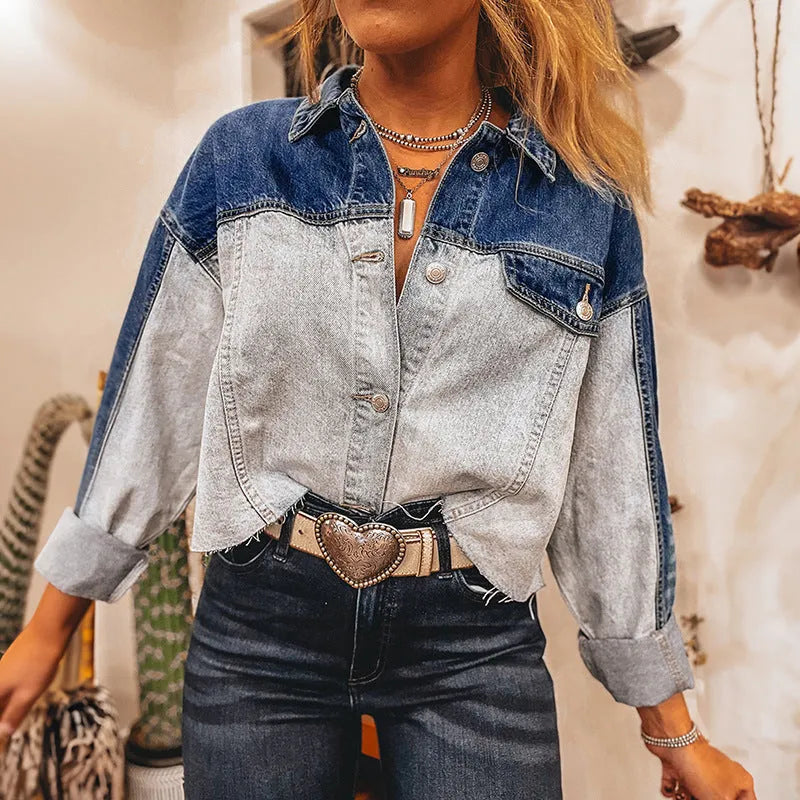 Women's denim coat with single row buckle fastening in loose fitting style