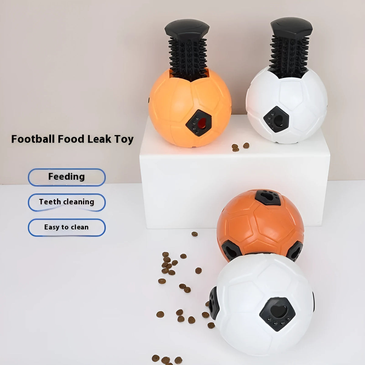 Orange and white TPR rubber dog toy ball with hollow design and teeth cleaning stick variant