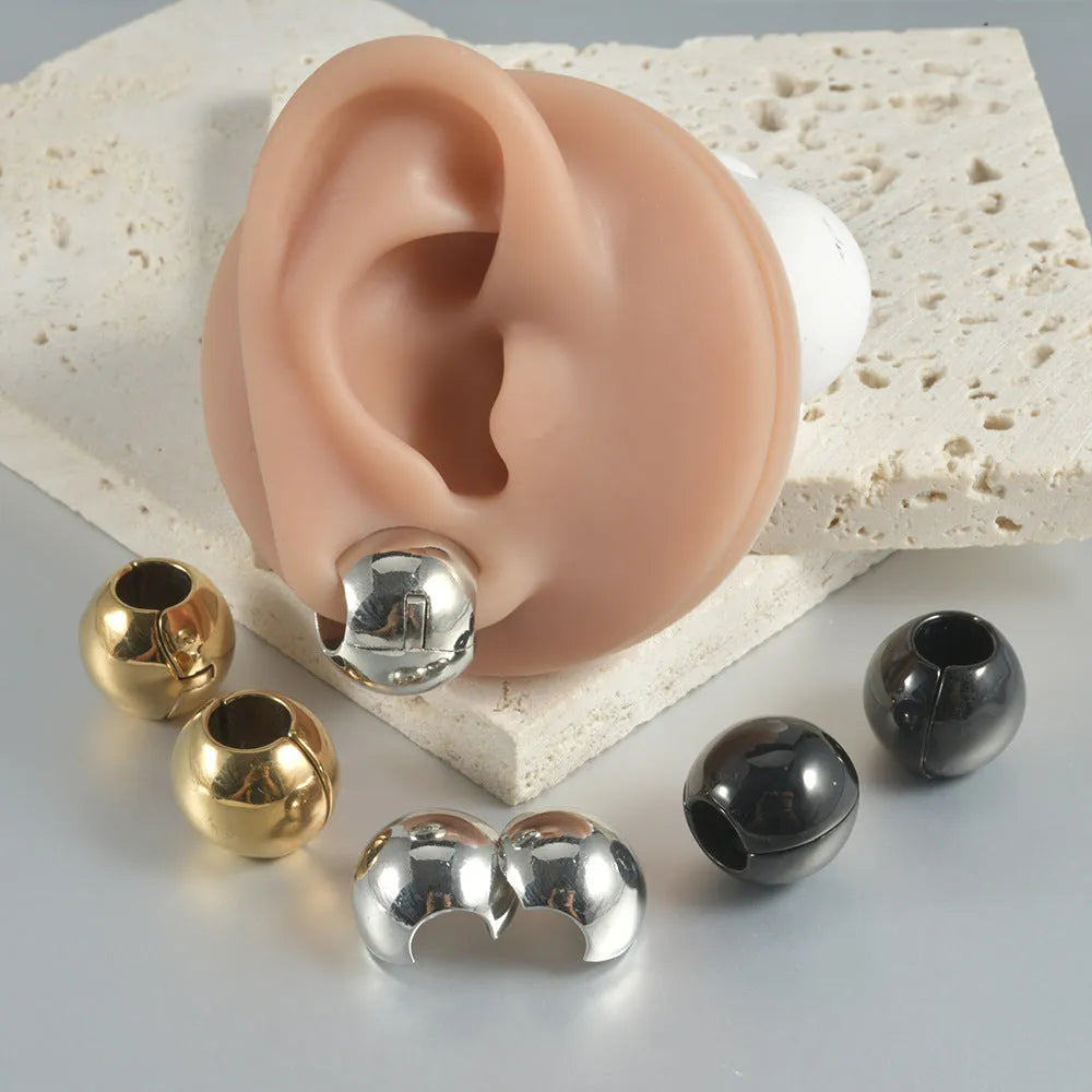 Stainless steel earrings with hollow skull and Buddha head geometric designs in multiple colour options