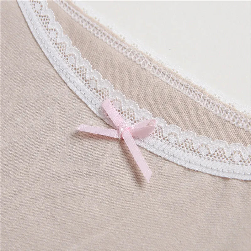 Girls' pure cotton lace vest with bow detail, available in multiple colours and sizes for heights 100-150 cm