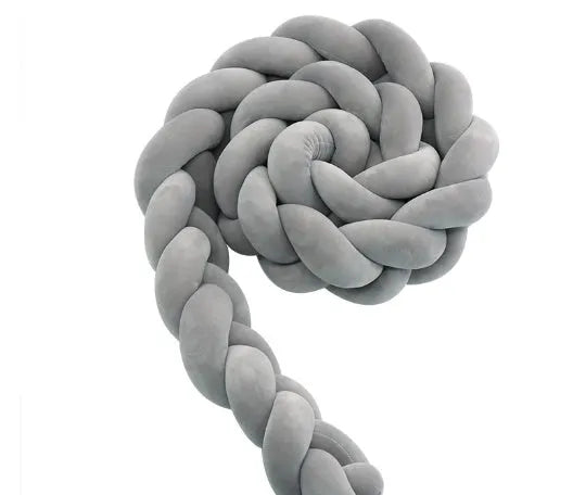 Baby crib bumper braid knot pillow cushion in spandex velvet fabric, shown in a multi-colour option.
