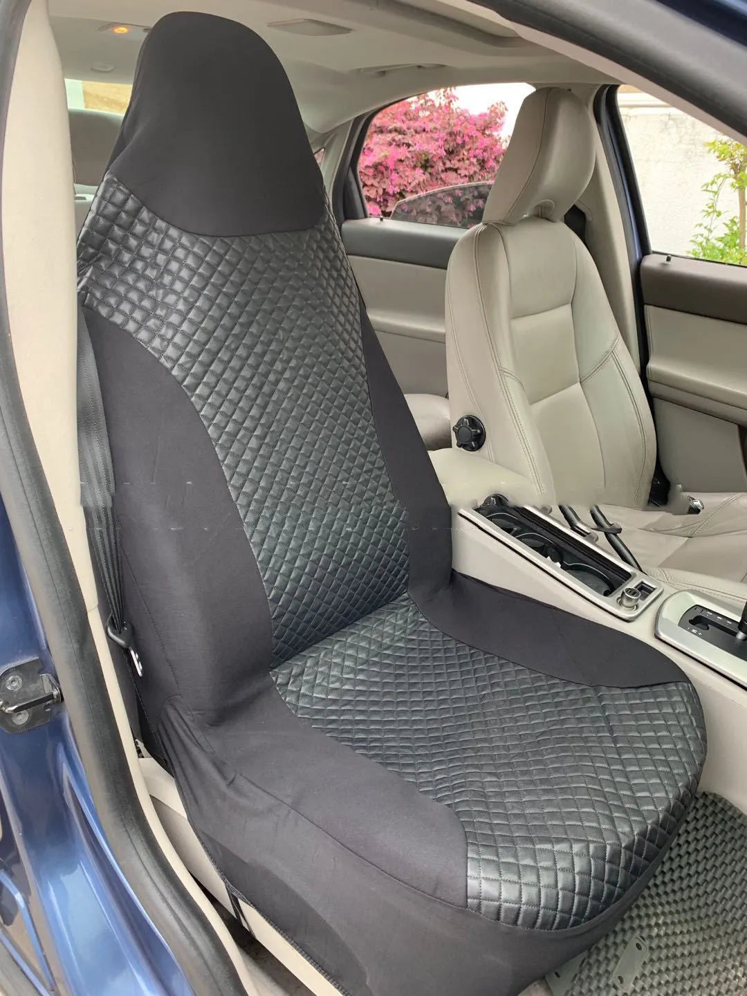 Black quilted automotive seat cover with PU and polyester construction