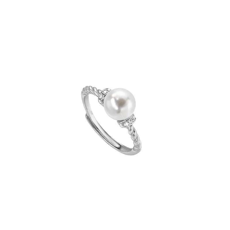 Adjustable antique twist pearl ring in copper with geometric shape and pearl inlay