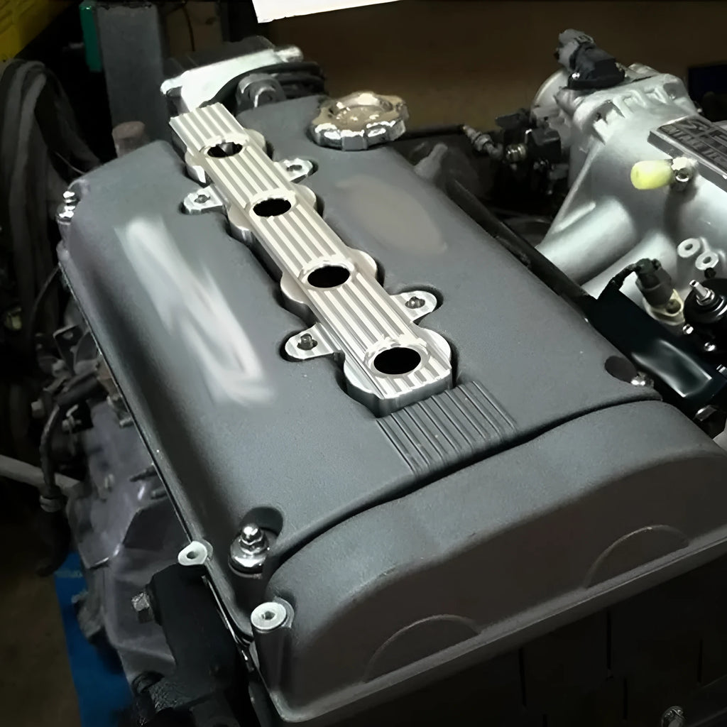 Aluminium alloy engine harness housing cover in blue, red, and silver, shown with and without mounting holes.