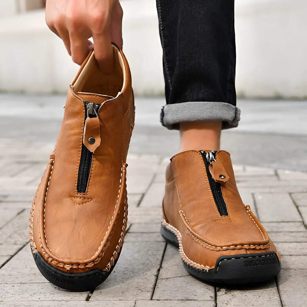 Men's slip-on leather loafers in black, brown and grey colours with round toe and rubber sole