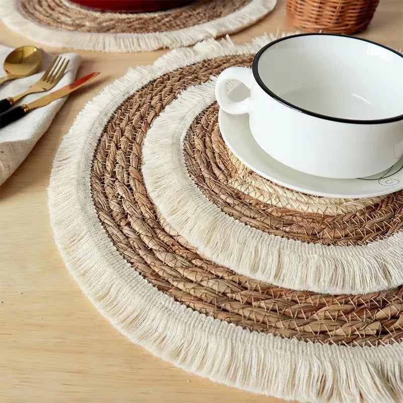 Round Japanese straw placemat with natural papyrus weave and tassel detailing in corn rope or plain style