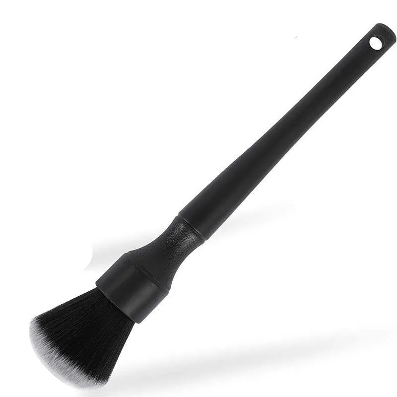 Black car detailing brush with ultra-soft pig hair bristles for gentle interior cleaning