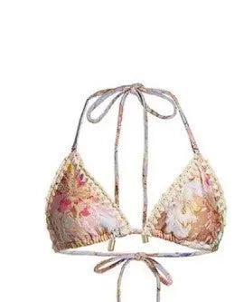 Women's floral print bikini set with matching skirt in creamy-white beige colour