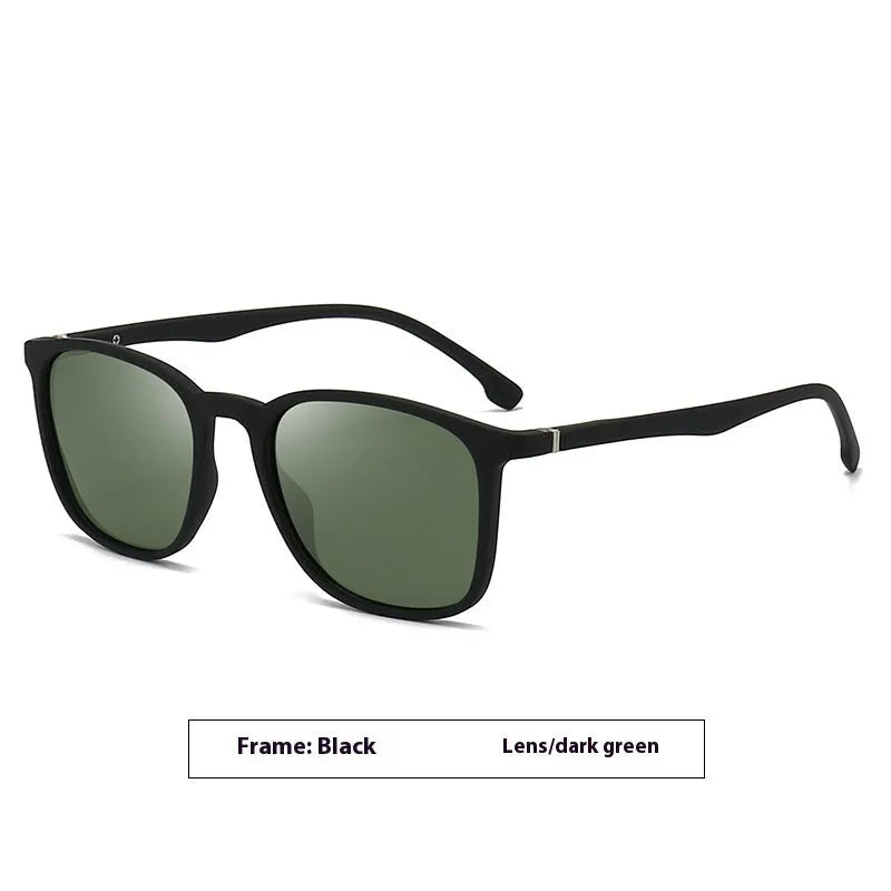 Men's polarised sunglasses with a black frame, dark green lenses, and an elastic grip spectacle foot.