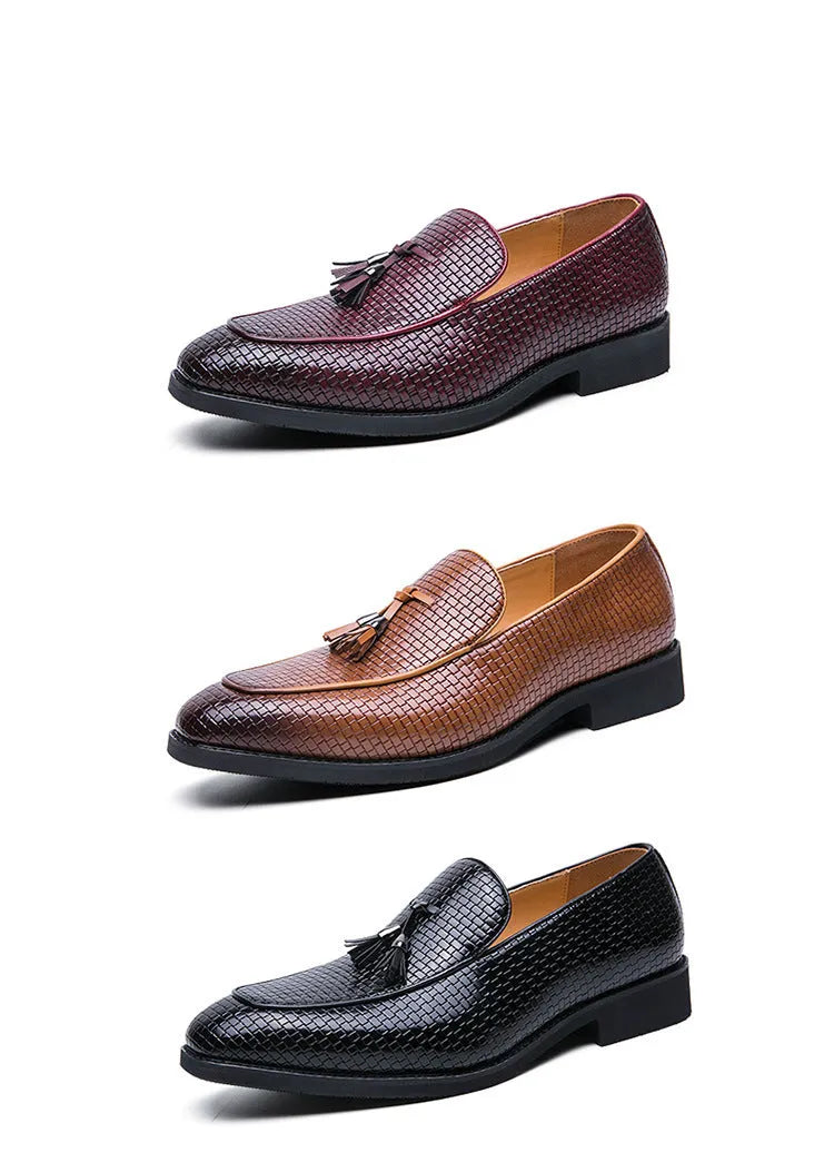 Men's black pointed toe slip-on shoes with a tassel detail on the low-top PU leather upper.