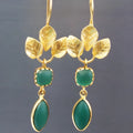 French Leaves retro water drop earrings in gold colour, made from copper, showing delicate drop shape.