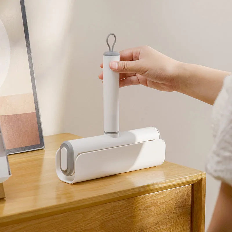 Lint remover roller with tearable paper stick for pet hair and dust removal