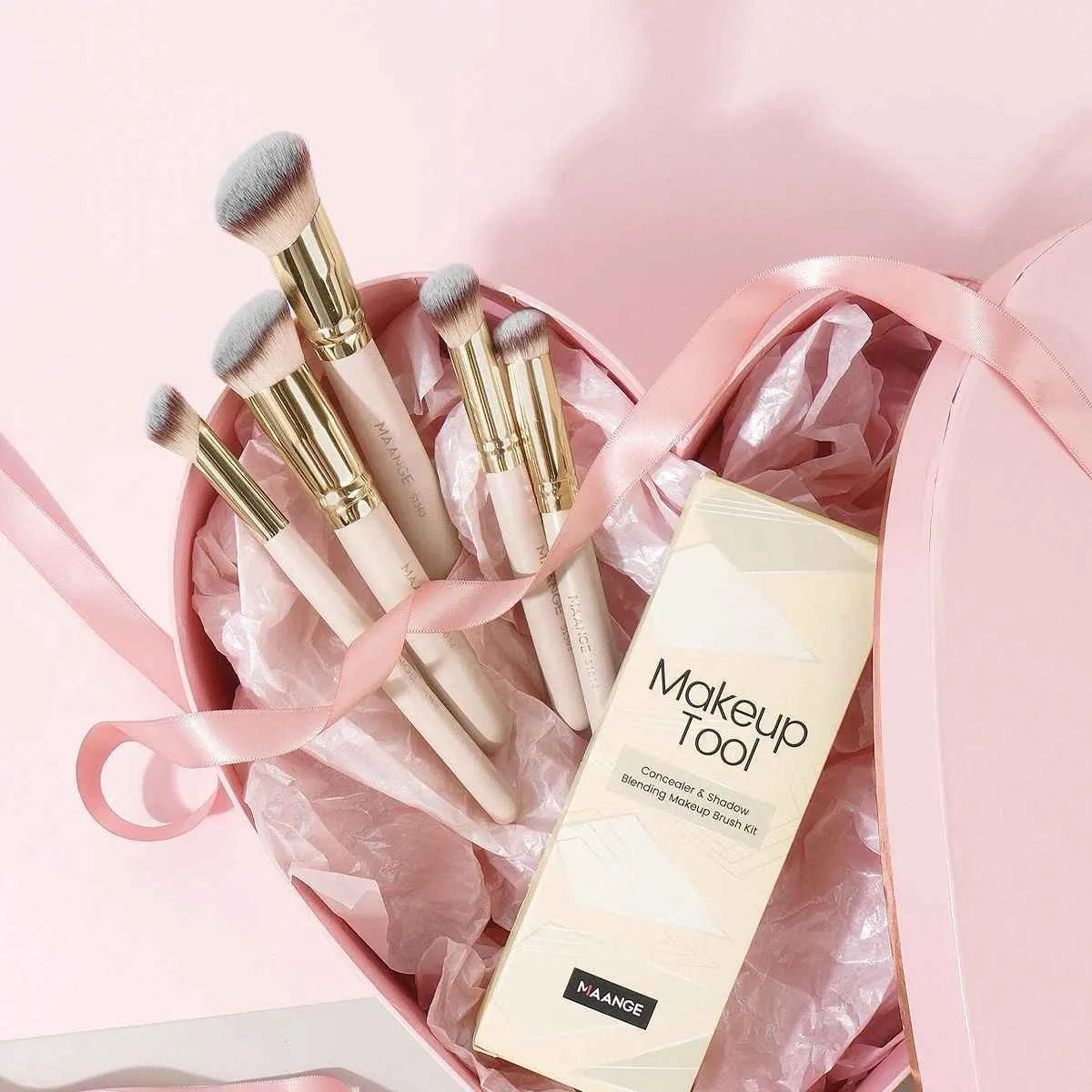 MAANGE set of five apricot-coloured angled kabuki makeup brushes with synthetic bristles.