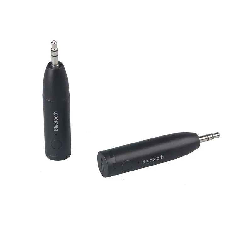 Black Bluetooth audio receiver for car stereo with AUX connection and USB power cable