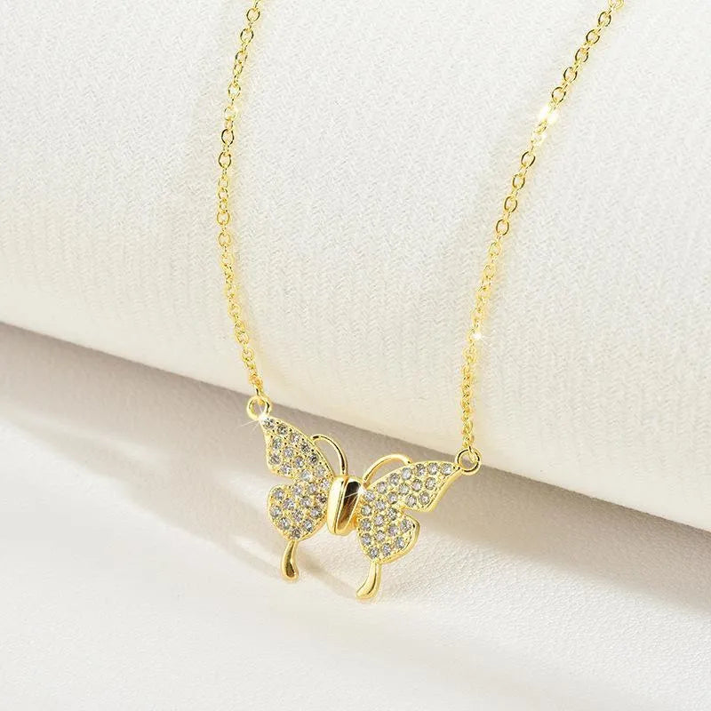 Gold titanium steel twisted chain necklace with magnetic butterfly clasp.