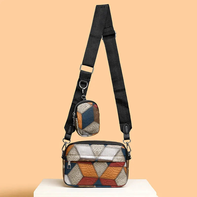 Small square crossbody bag with contrast stitching, PU outer, polyester lining, black or yellow colour matching.