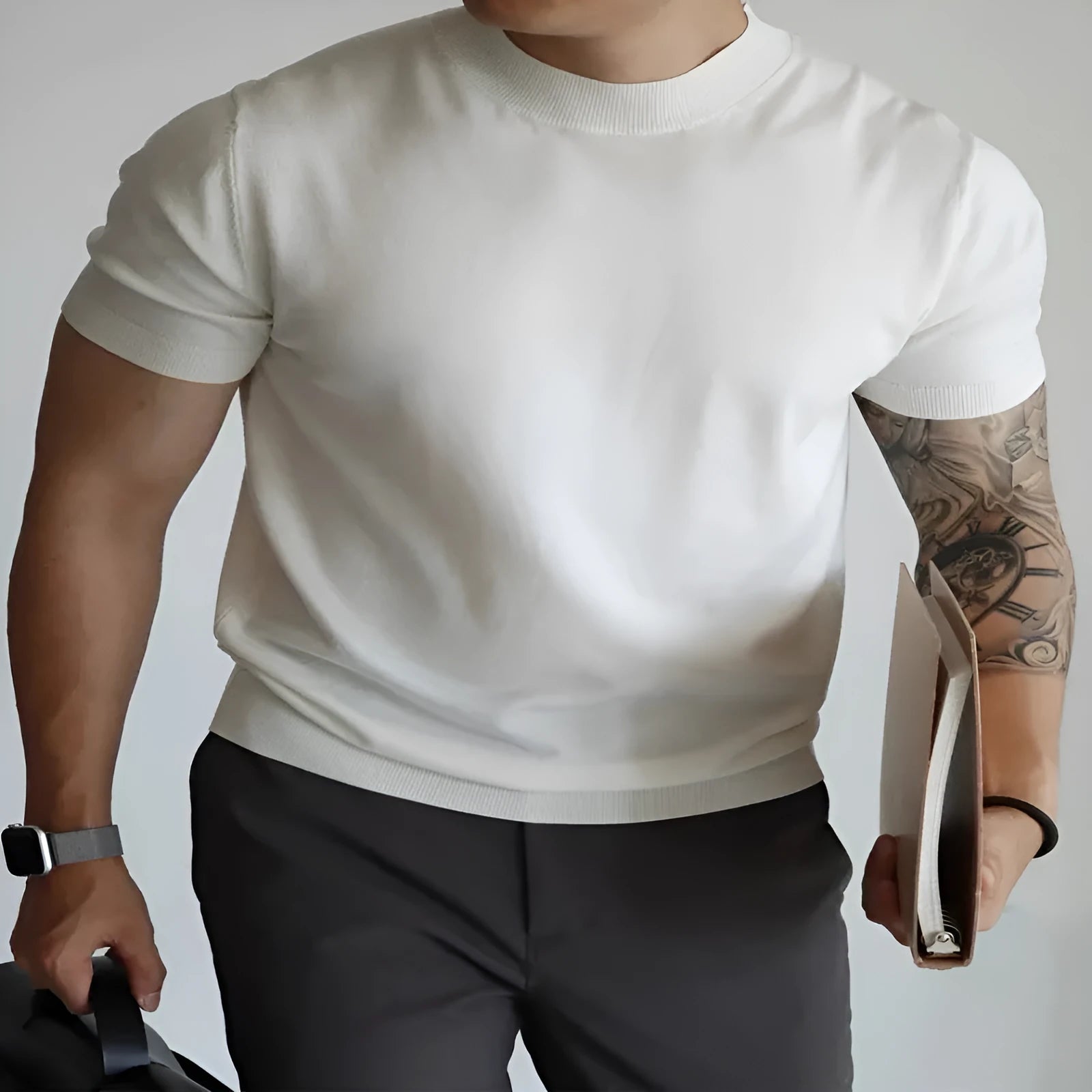 Men's slim-fit short sleeve t-shirt in solid colour on a hanger.