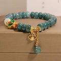 Blue water jade abacus beads crystal bracelet with butterfly clasp and white agate accents
