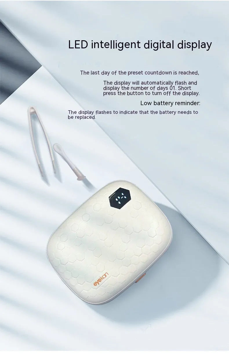 Portable automatic ultrasonic contact lens cleaning machine in pearl white measuring 85x65x30mm