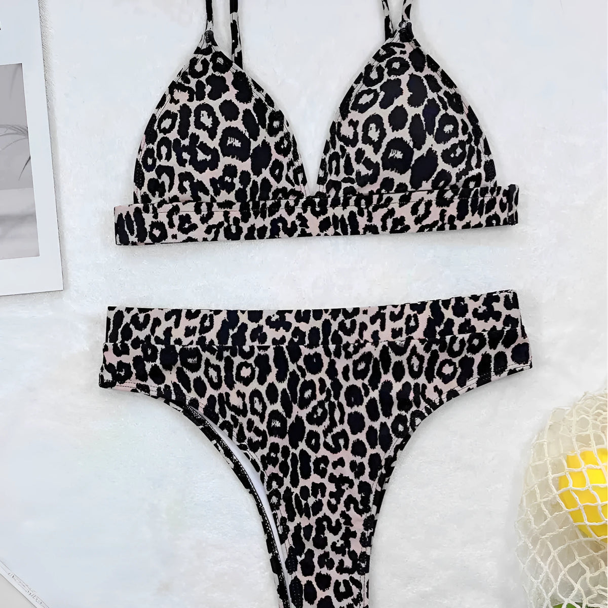 Leopard print women's bikini swimsuit with backless briefs style, polyester fabric and spandex lining, sizes S M L