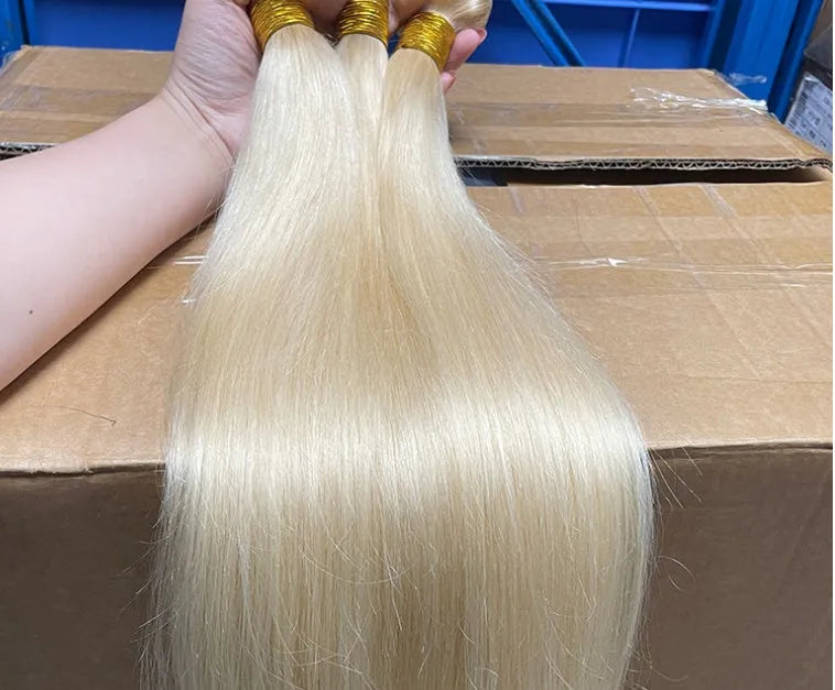 Gold human hair curtain bone straight wig on mannequin head showing long hair length