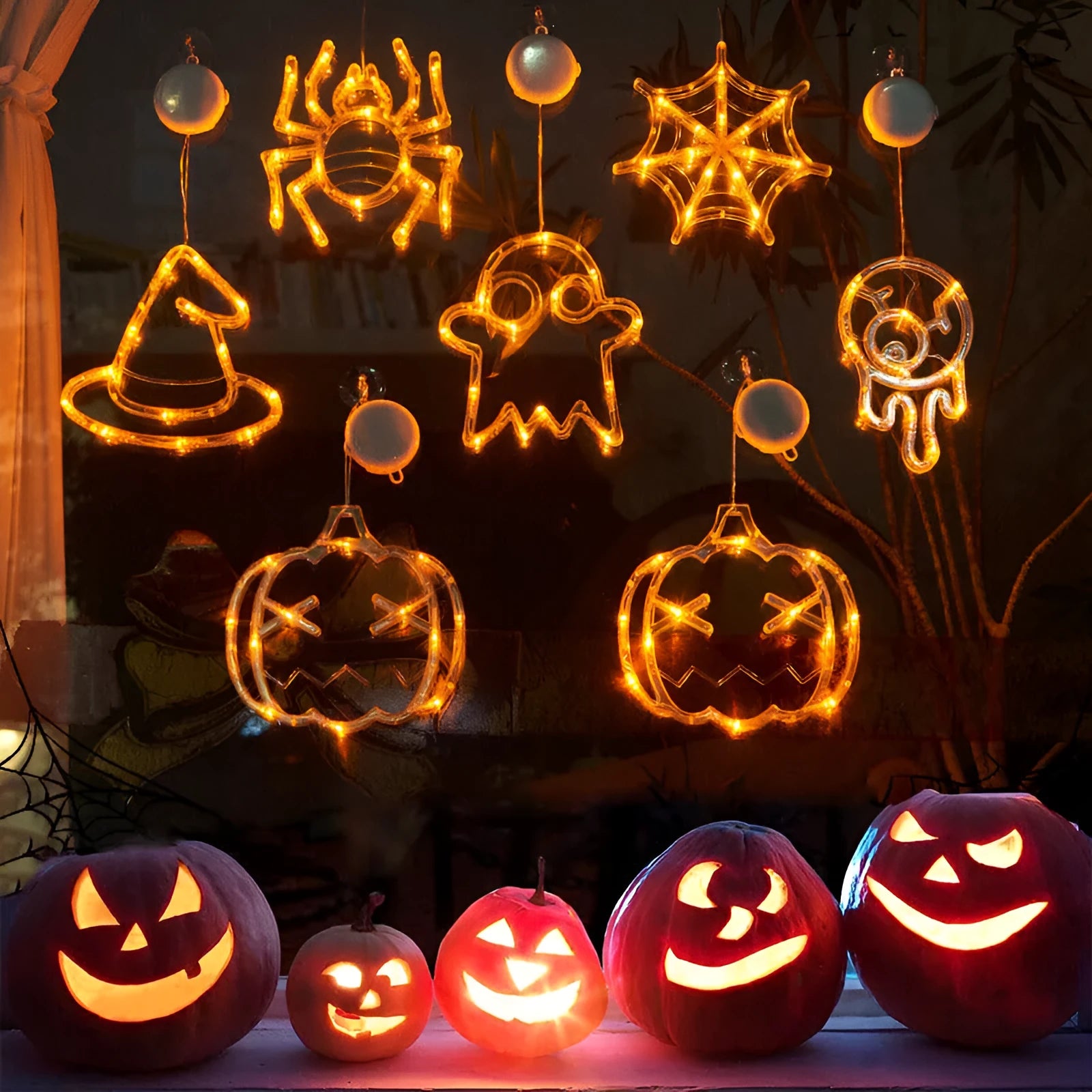 Halloween window hanging LED lights with spider and pumpkin decorations creating horror atmosphere lighting