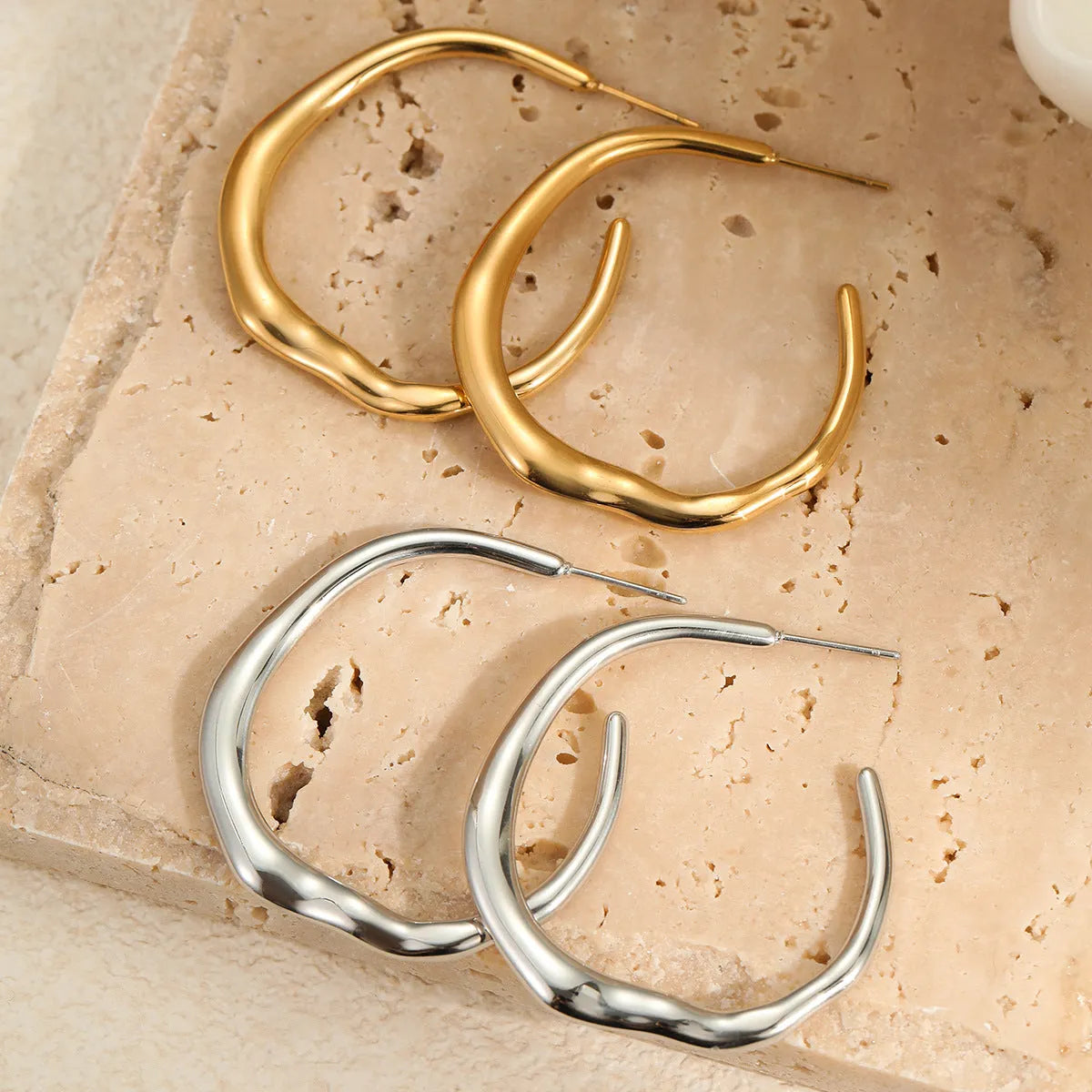 C-ring earrings in stainless steel with 18K gold plating, geometric shape, gold and steel colour options, sold as a pair