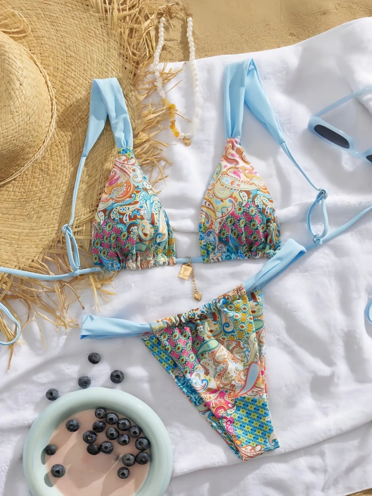 Floral print two-piece bikini set with polyester lining, backless briefs style, sizes XS to XL