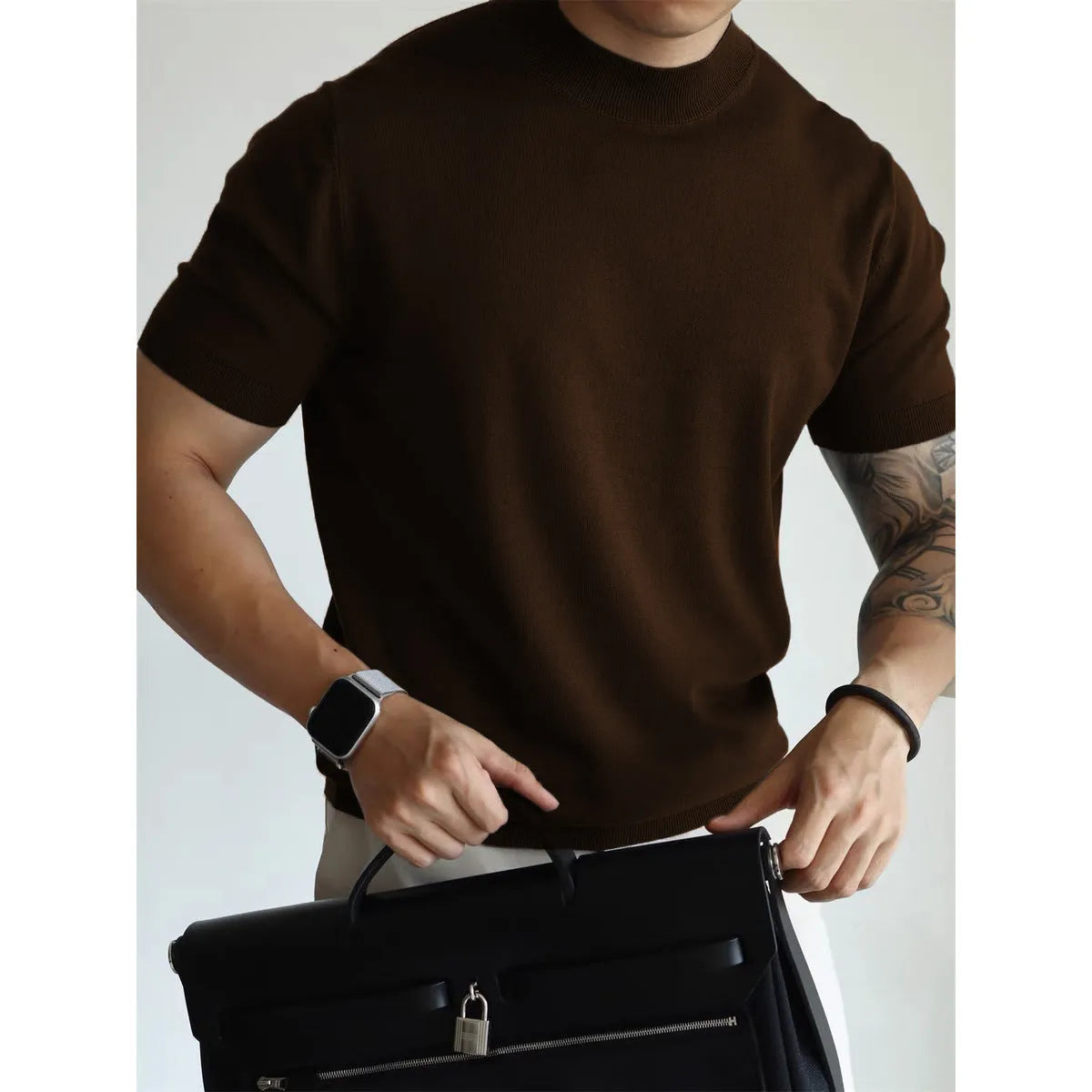 Men's slim-fit short sleeve t-shirt in solid colour on a hanger.