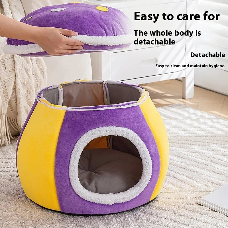 Grey mushroom-shaped plush cat nest with a detachable blanket on a wooden floor.