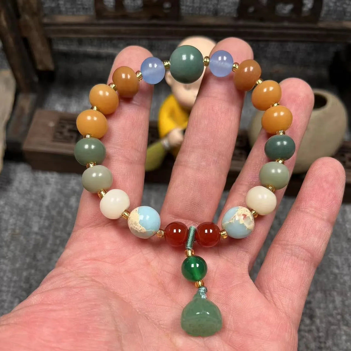 Hand-carved pumpkin lotus beads bracelet in white jade and bodhi root with multiple bead sizes