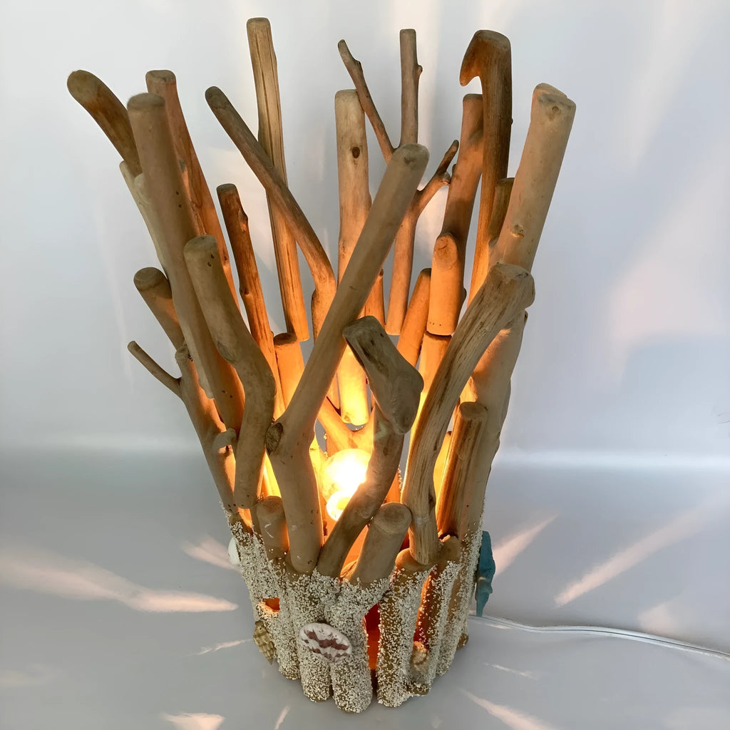 Driftwood decorative table lamp with wood colour finish and 24.5cm square base on a desk