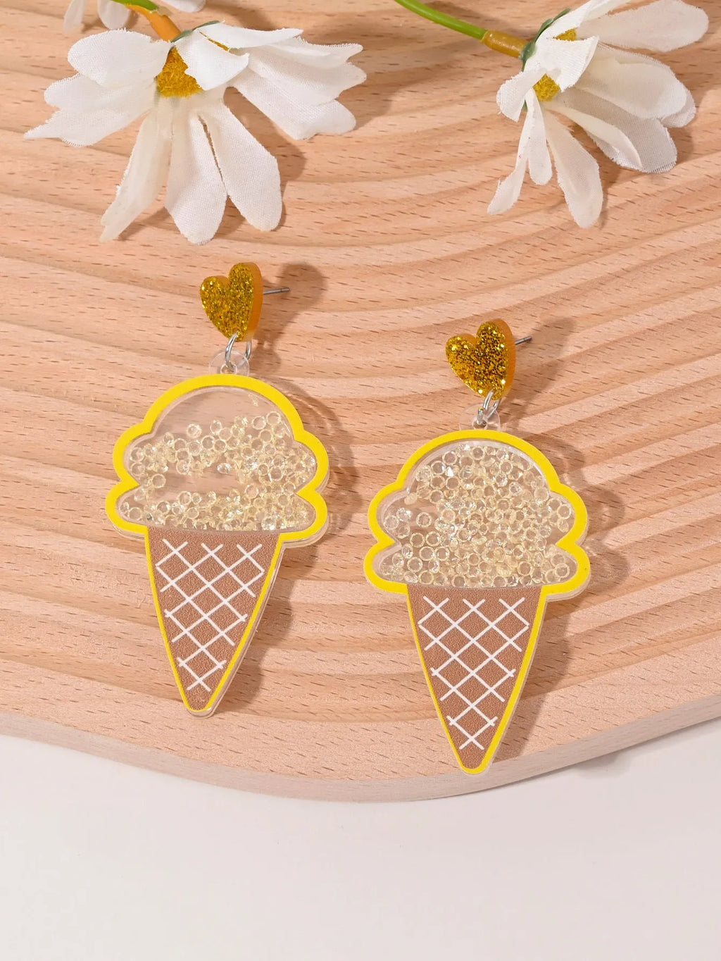 Set of acrylic earrings shaped like cherry, strawberry, watermelon, pineapple, coconut, cake, and ice cream.