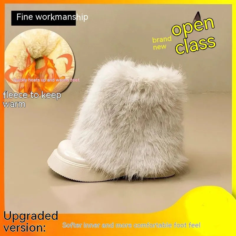 Women's black artificial plush snow boots with waterproof platform sole and low top design.