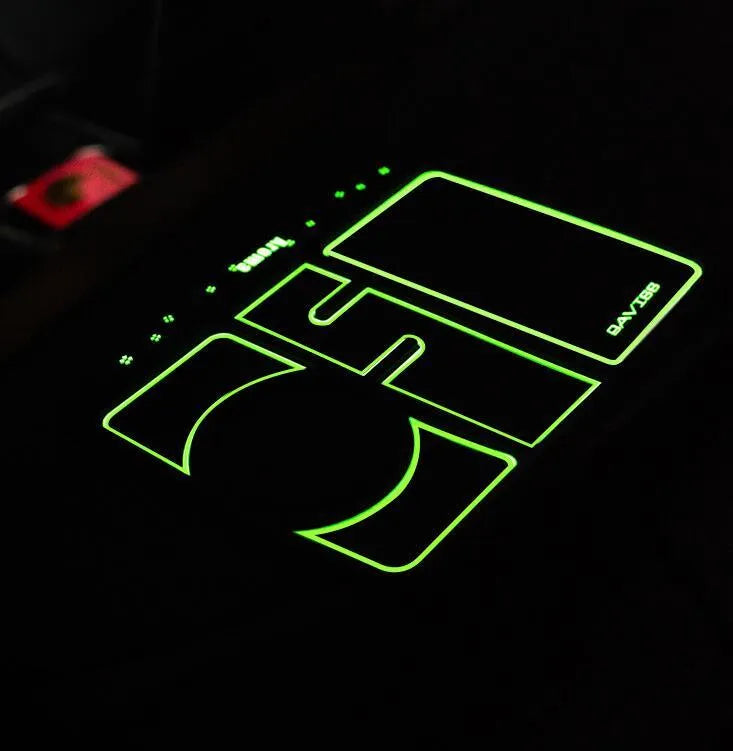 Black non-slip car phone pad with red edge on dashboard, 4-in-1 design with 360 degree rotation, PVC material