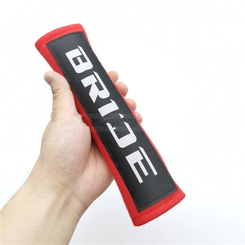 Car seat belt shoulder pad set in black blue red colours with embroidery on cotton sponge cloth