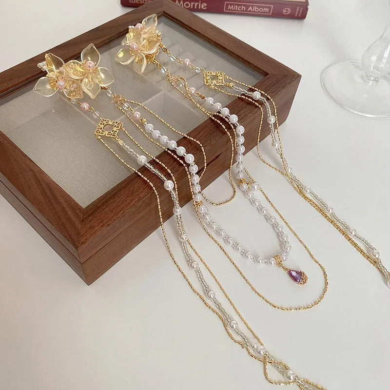 Women's gold hairpin with acrylic pearl diamond flower decoration and long tassel