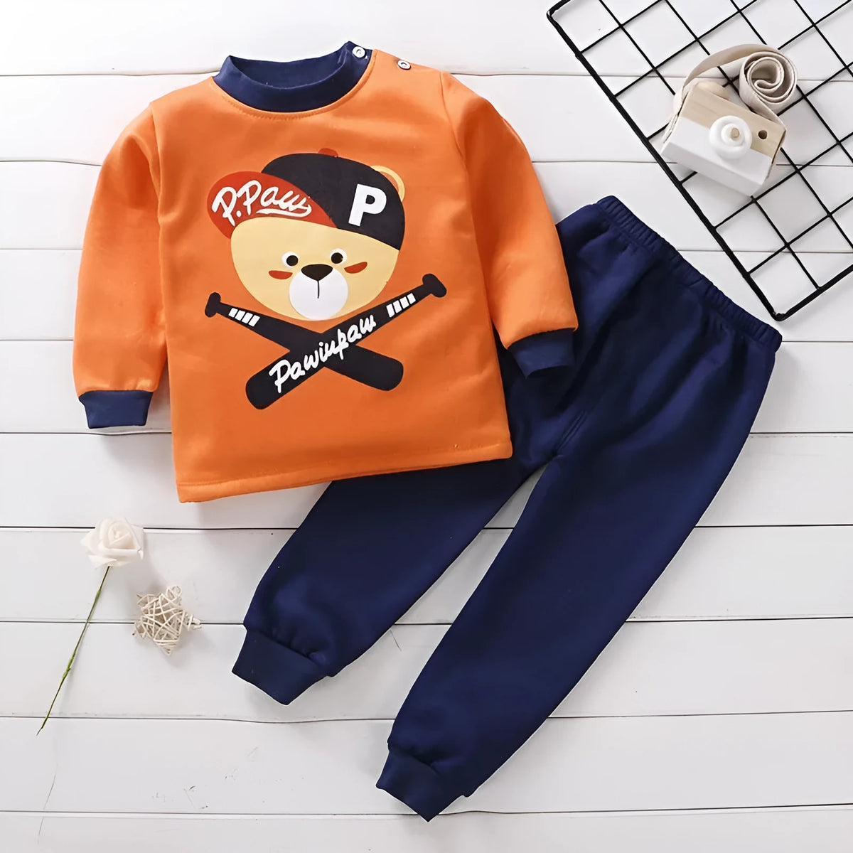 Children's thermal underwear set in coral fleece with cotton main fabric, thickened two-piece base layer in nine cartoon print colourways.