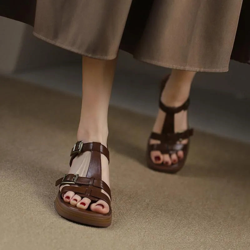 Women's black retro high heel sandals with a T-shaped buckle and chunky platform sole.