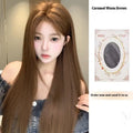 Women's warm brown wig with centre-parted bangs and long straight hair style showing forehead lace detail